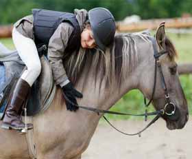 Fototapeten Reiten